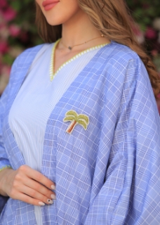 Picture of Bisht set with handmade palm tree charm.